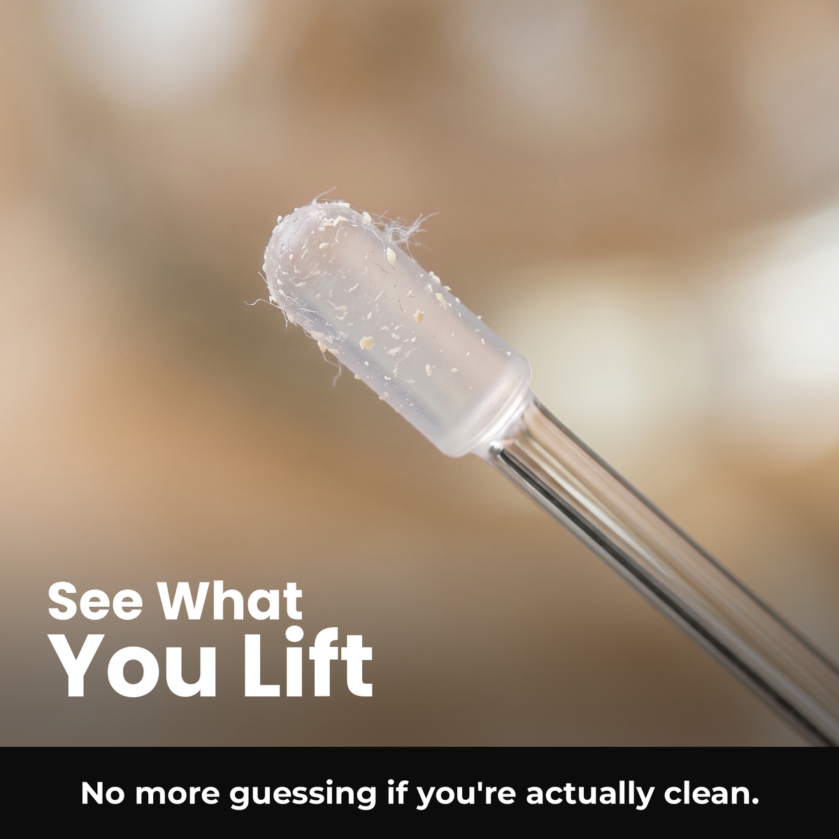 Voria EarClean sticky tip macro with light lint residue